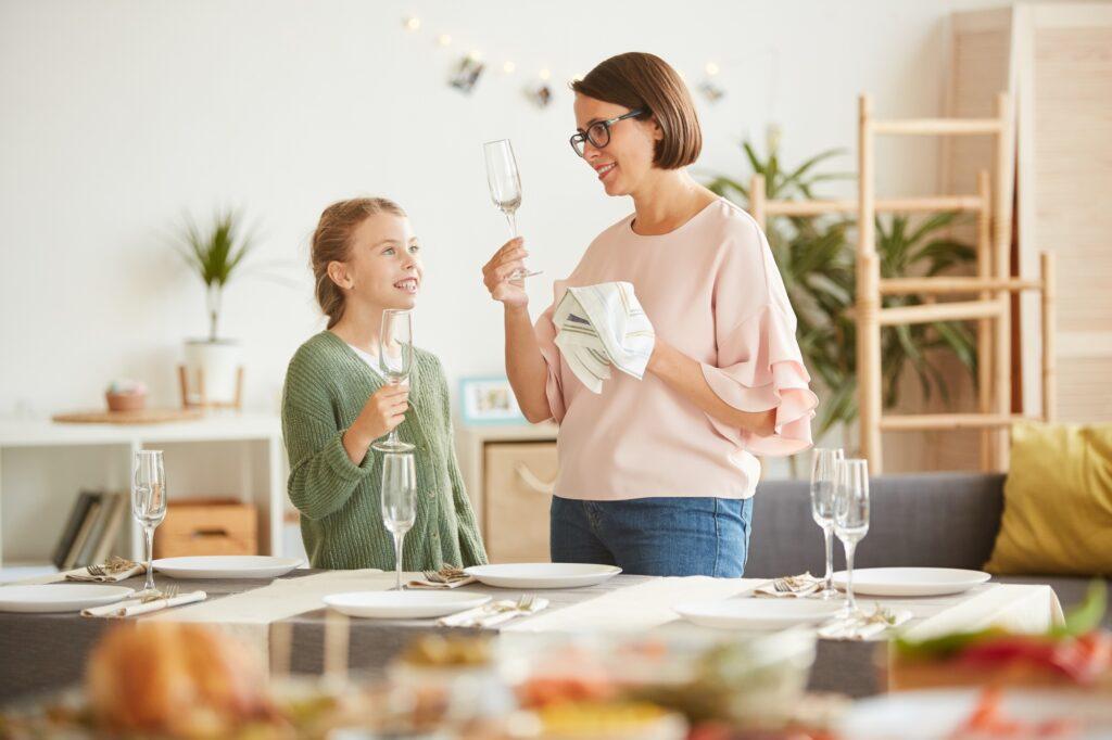Mom and daughter preparing for dinner