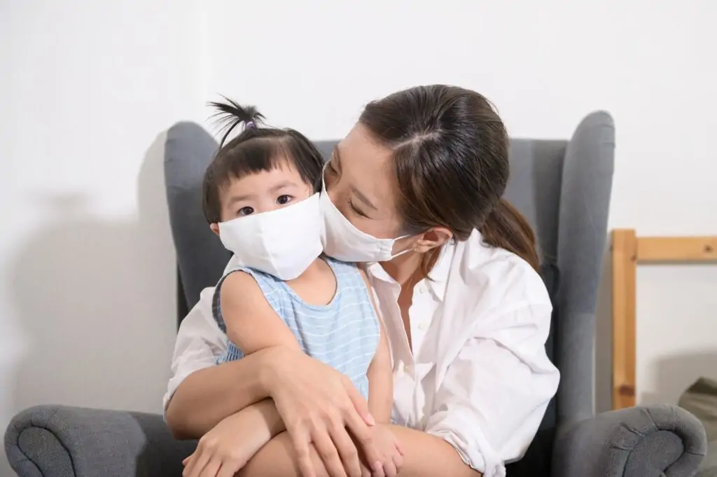 Mom baby girl wearing mask