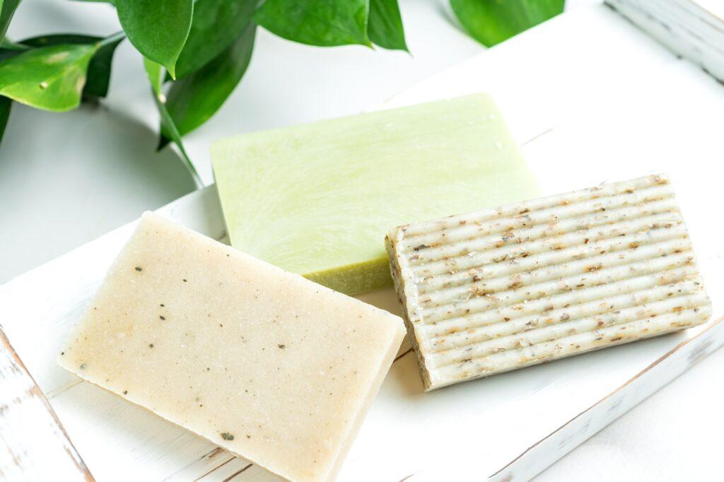 Homemade soap concept closeup, organic handmade soap with oils, herbal ngredients, spa and skin care