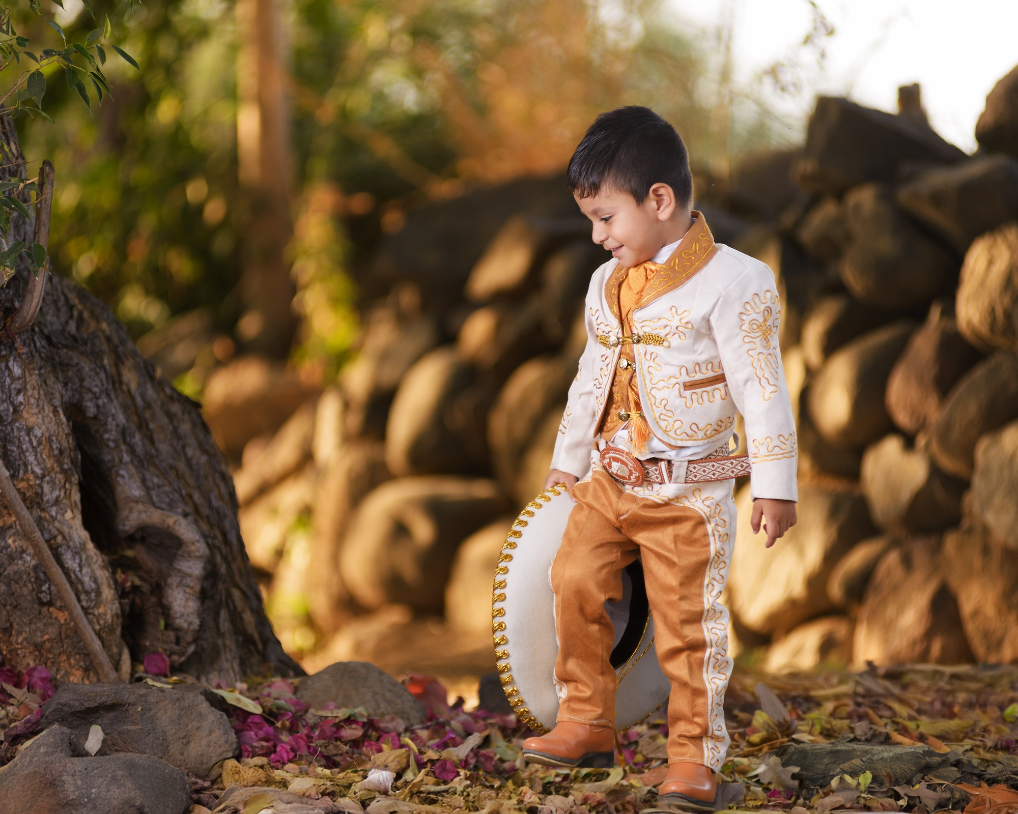 A child dressed in a charro costume